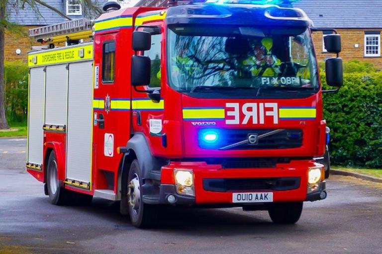 Fire engine with blue flashing lights