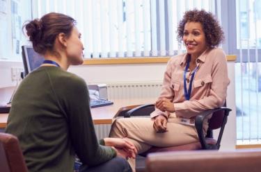 Two females in meeting