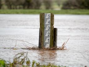 Flooded field and water gauge